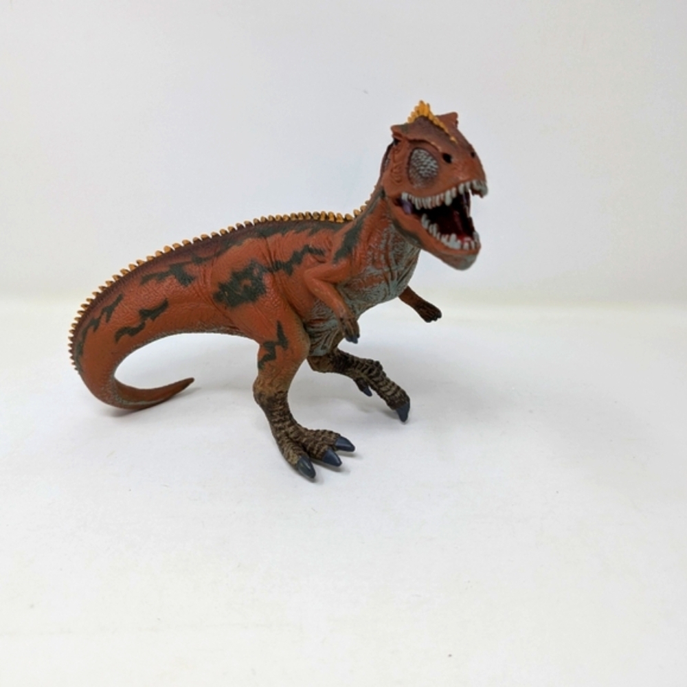 T-Rex 6" toy dinosaur figurine.